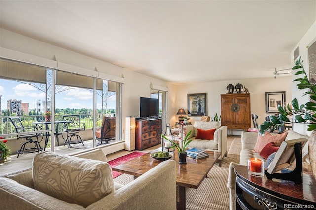 living room with a city view and visible vents