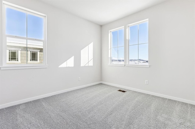 view of carpeted spare room