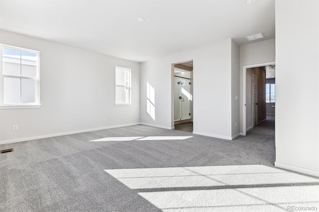 spare room featuring carpet flooring