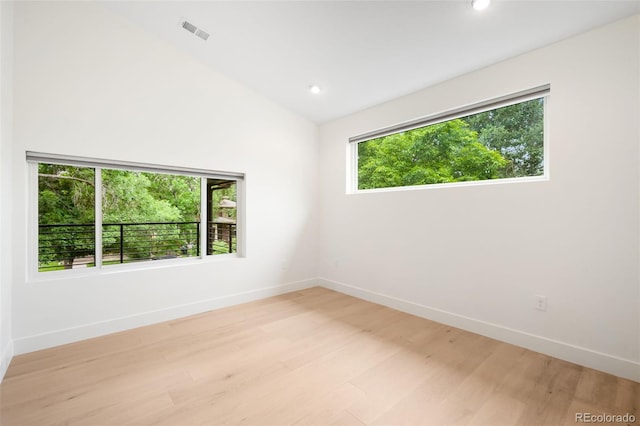 863 S Race St, Denver, CO 80209 - unfurnished room featuring plenty of natural light, light wood-type flooring, recessed lighting, and lofted ceiling