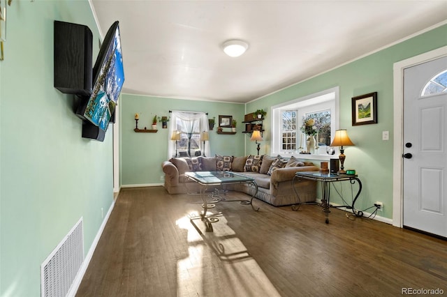 living room with dark hardwood / wood-style floors