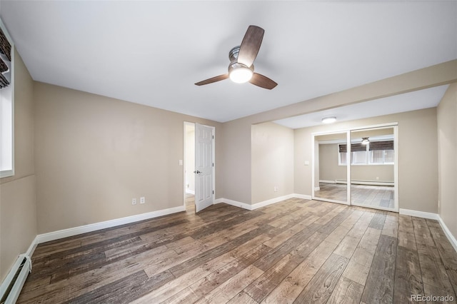 8051 S Kendall Blvd, Littleton, CO 80128 - empty room with a baseboard radiator, a ceiling fan, a baseboard heating unit, and wood-type flooring
