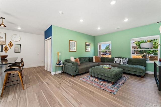 550 S Raleigh St, Denver, CO 80219 - living area featuring light wood-style flooring and recessed lighting
