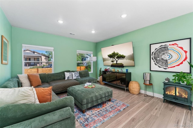 550 S Raleigh St, Denver, CO 80219 - living area featuring light wood-type flooring and recessed lighting