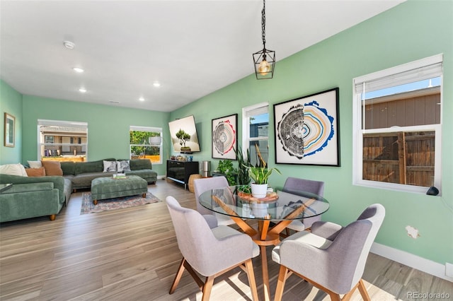 550 S Raleigh St, Denver, CO 80219 - dining area with wood finished floors and recessed lighting