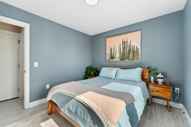 550 S Raleigh St, Denver, CO 80219 - bedroom featuring light wood-style flooring