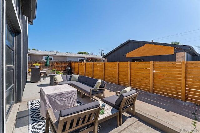 550 S Raleigh St, Denver, CO 80219 - fenced backyard featuring outdoor lounge area, a patio, and outdoor dining area