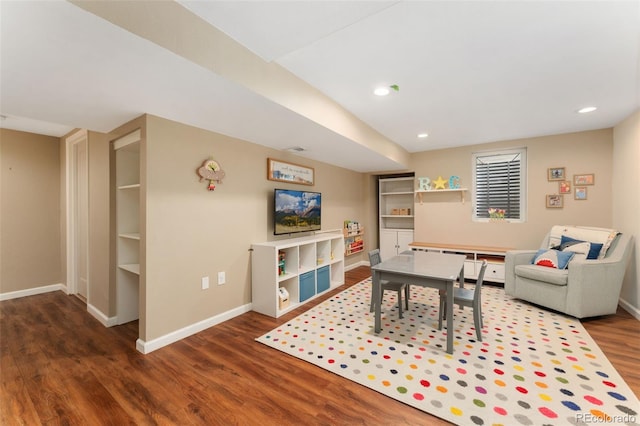 game room with baseboards, wood finished floors, and recessed lighting