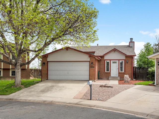 view of front of home with fence, a garage, a chimney, concrete driveway, and brick siding