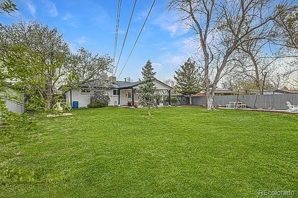 view of yard with fence