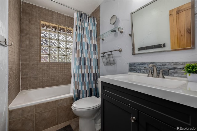 54 Zaza Ln, Evergreen, CO 80439 - bathroom with vanity, toilet, and tiled shower / bath