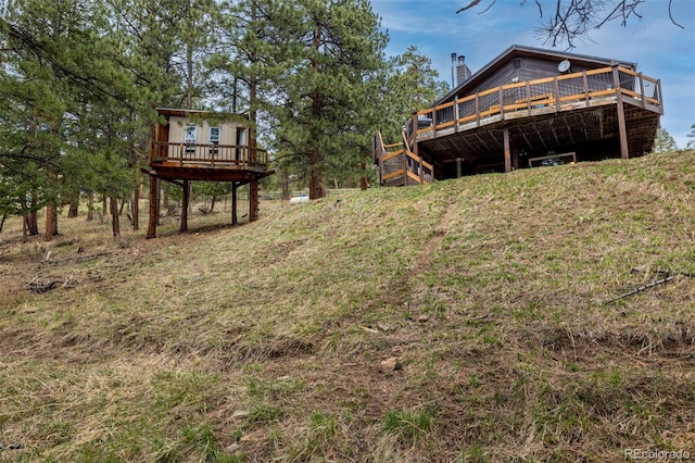 54 Zaza Ln, Evergreen, CO 80439 - view of yard featuring a deck