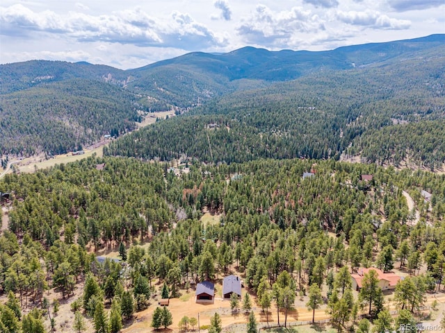 54 Zaza Ln, Evergreen, CO 80439 - drone / aerial view of a forest and a mountainous background