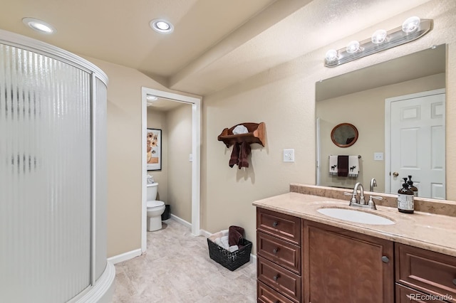 10463 Nucla St, Commerce City, CO 80022 - bathroom with a shower stall, vanity, and recessed lighting