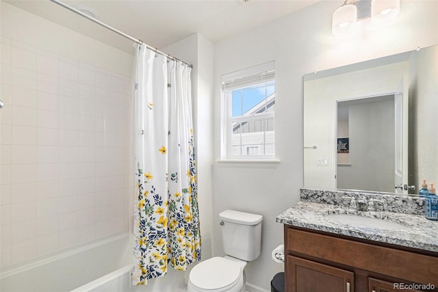 full bathroom featuring vanity, shower / tub combo with curtain, and toilet