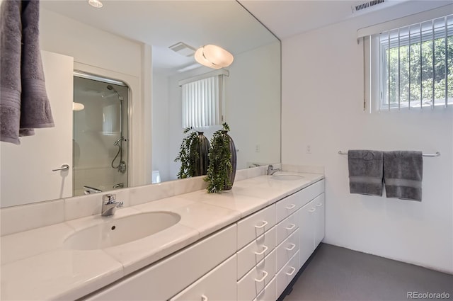 bathroom featuring vanity, a shower, and toilet