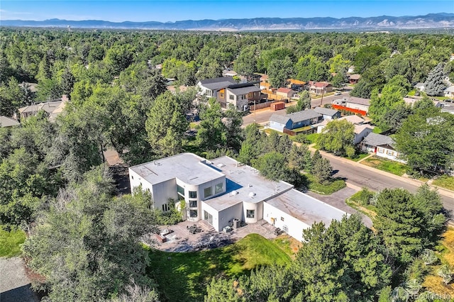 drone / aerial view featuring a mountain view