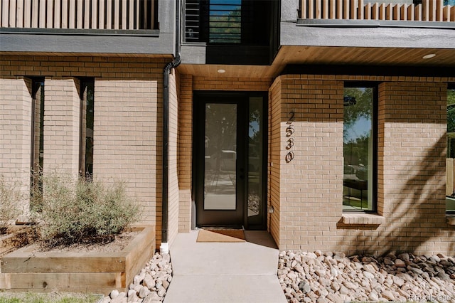 2530 Chase, Edgewater, CO 80215 - entrance to property with a balcony and brick siding