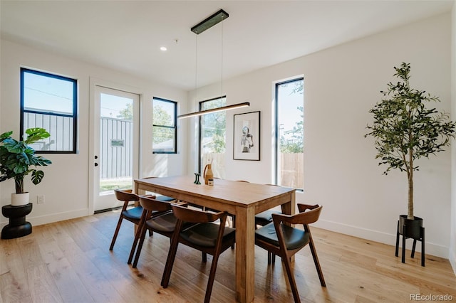 2530 Chase, Edgewater, CO 80215 - dining area with baseboards, light wood finished floors, and recessed lighting