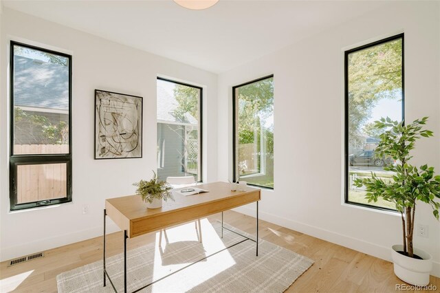 2530 Chase, Edgewater, CO 80215 - home office featuring light wood finished floors and baseboards