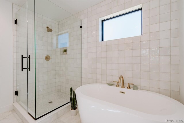 2530 Chase, Edgewater, CO 80215 - bathroom with a stall shower and a soaking tub