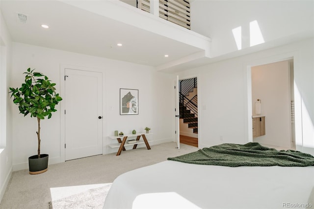2530 Chase, Edgewater, CO 80215 - bedroom featuring light colored carpet, recessed lighting, ensuite bath, and baseboards