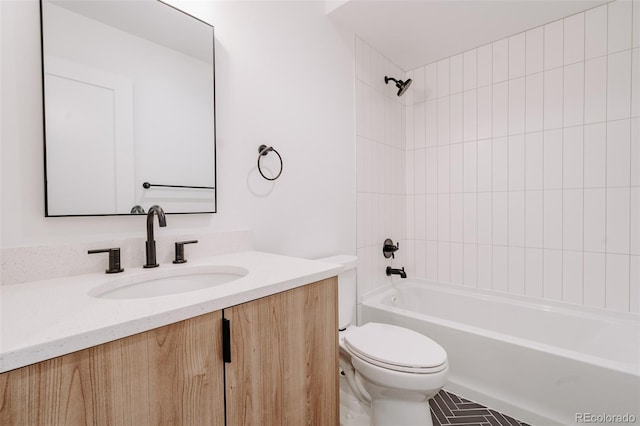 2530 Chase, Edgewater, CO 80215 - full bath featuring toilet, washtub / shower combination, and vanity