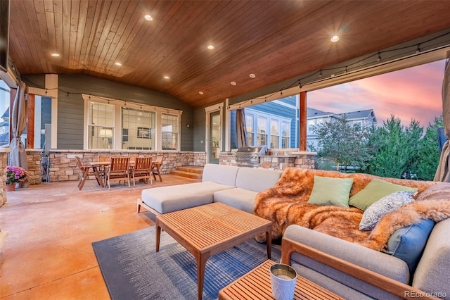 interior space with wood ceiling and lofted ceiling