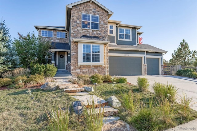 view of front of home with a garage