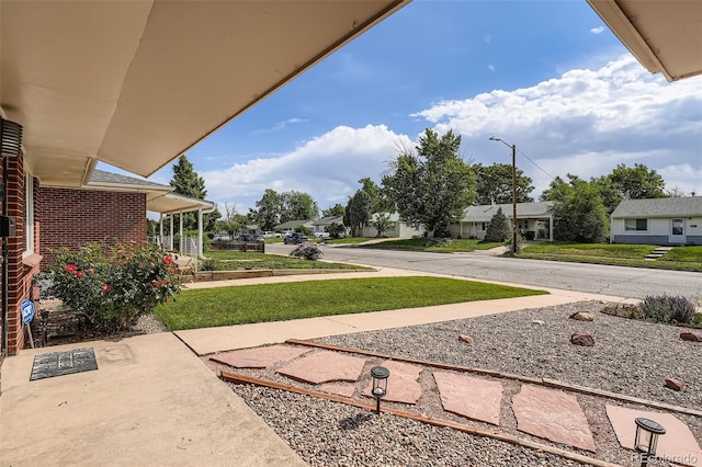 1785 S Zuni St, Denver, CO 80223 - view of green lawn with a residential view