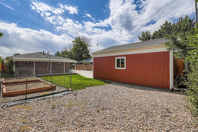 1785 S Zuni St, Denver, CO 80223 - view of yard with a vegetable garden