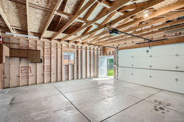 1785 S Zuni St, Denver, CO 80223 - garage featuring a garage door opener
