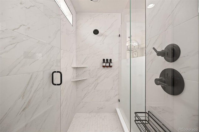 bathroom with a shower stall
