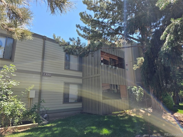 2525 S Dayton Way Unit 2307, Denver, CO 80231 - rear view of house featuring a balcony