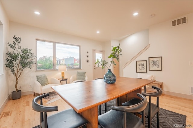 6892 Juniper Ct, Arvada, CO 80007 - dining room featuring wood finished floors and recessed lighting