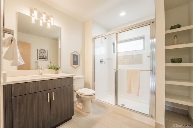 6892 Juniper Ct, Arvada, CO 80007 - bathroom with vanity and a stall shower