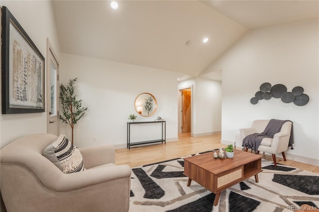 6892 Juniper Ct, Arvada, CO 80007 - living room featuring light wood-style flooring, recessed lighting, and high vaulted ceiling