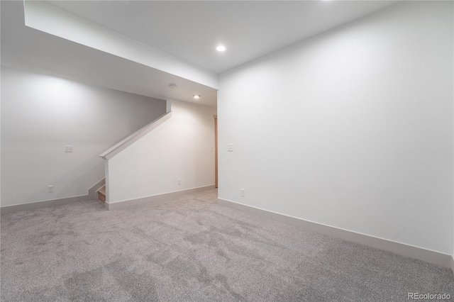 6892 Juniper Ct, Arvada, CO 80007 - carpeted spare room with recessed lighting and stairs