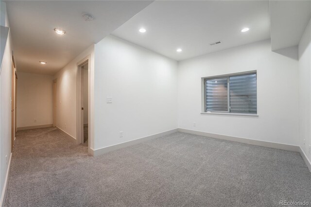 6892 Juniper Ct, Arvada, CO 80007 - carpeted empty room featuring a smoke detector and recessed lighting