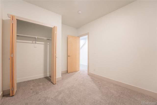 6892 Juniper Ct, Arvada, CO 80007 - unfurnished bedroom featuring carpet flooring and a closet