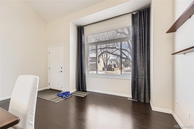 interior space with dark wood-type flooring