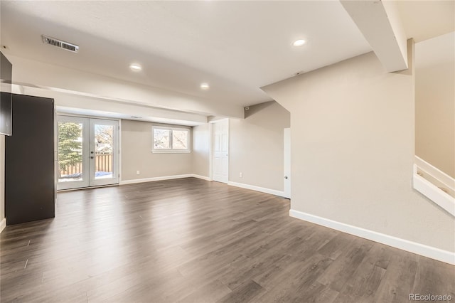 interior space featuring french doors and dark hardwood / wood-style flooring