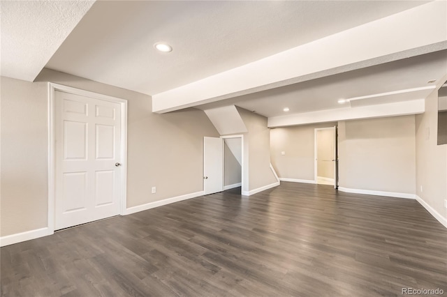 basement with dark wood-type flooring