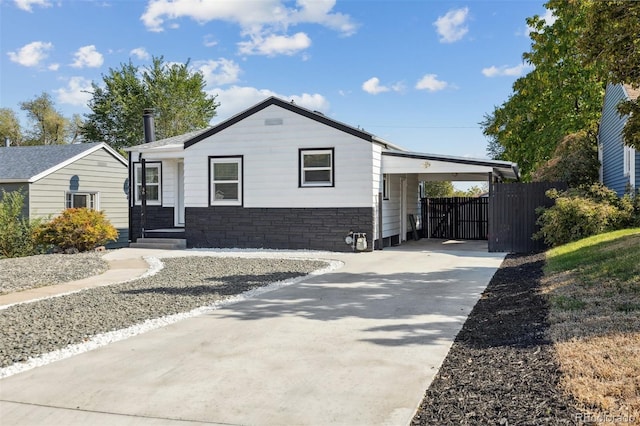 view of front of home with a carport