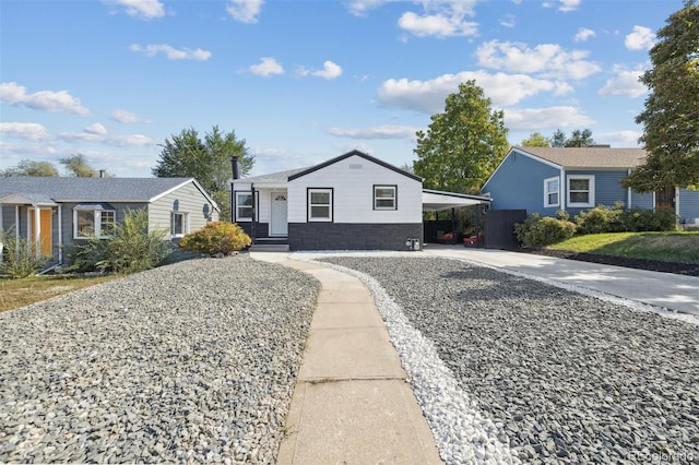 ranch-style house with a carport