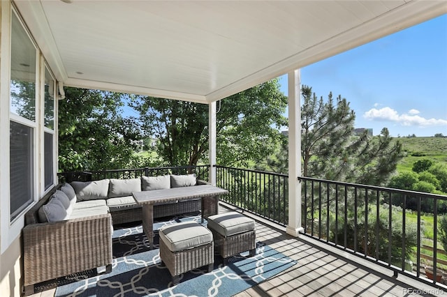 10601 Chadsworth Ln, Highlands Ranch, CO 80126 - wooden deck with outdoor lounge area