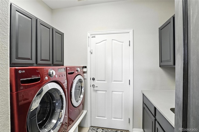 10601 Chadsworth Ln, Highlands Ranch, CO 80126 - laundry area with cabinet space and washer and dryer