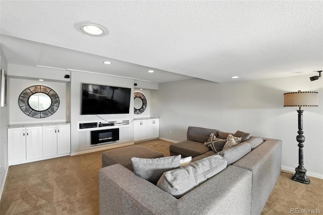 10601 Chadsworth Ln, Highlands Ranch, CO 80126 - living room with light carpet, a textured ceiling, recessed lighting, and a glass covered fireplace