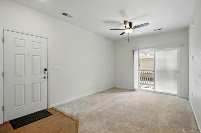 1881 S Dunkirk St Unit 106, Aurora, CO 80017 - carpeted spare room featuring ceiling fan, visible vents, and baseboards