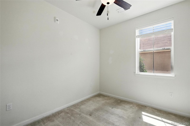 1881 S Dunkirk St Unit 106, Aurora, CO 80017 - unfurnished room with baseboards, a ceiling fan, and carpet
